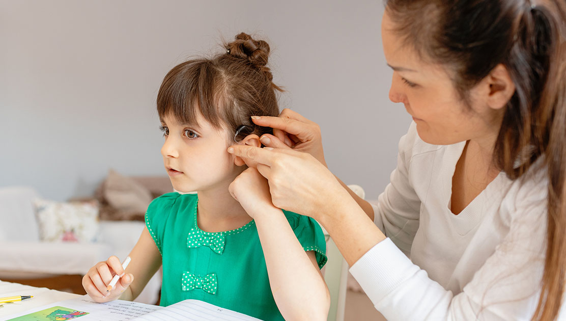 Teacher with student - Deaf and Hard of Hearing Credential