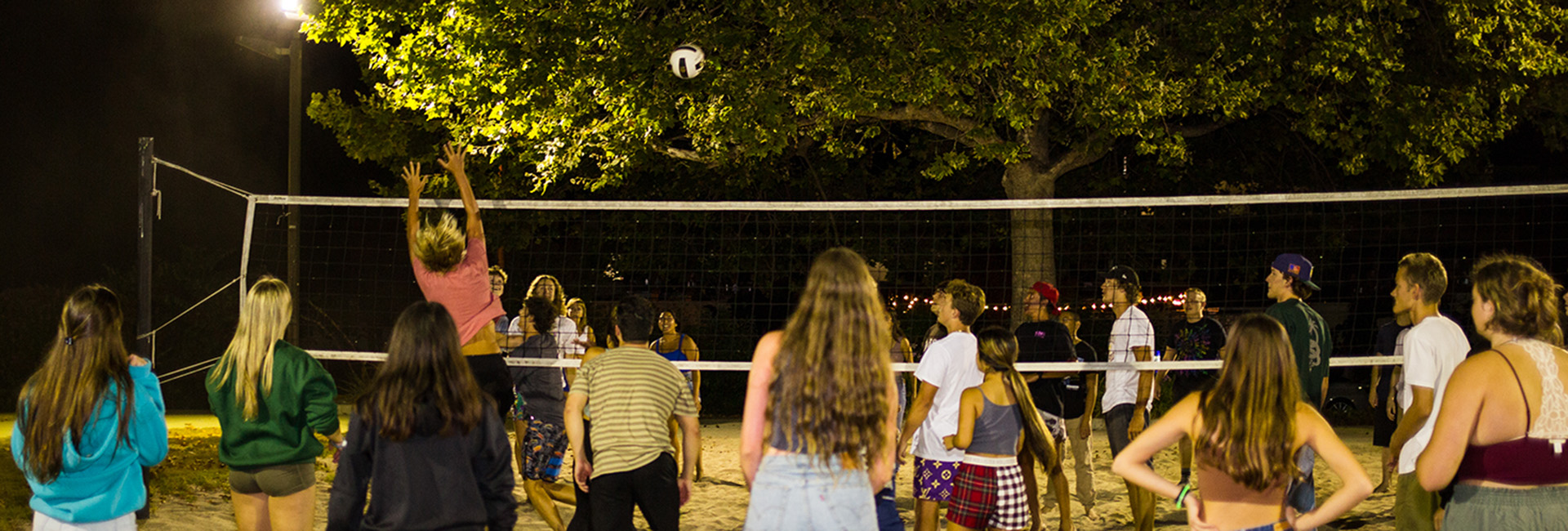 Students playing volleyball